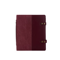 della Q Hook & Needle Notebook in the color maroon