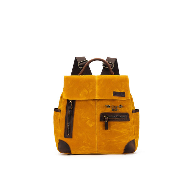 della Q Maker's Midi Backpack in the color Mustard
