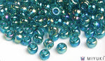 Miyuki 6/0 glass seed beads in the color 2458 Transparent Teal AB
