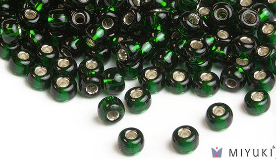 Miyuki 6/0 glass seed beads in the color 27 Silver lined Deep Emerald