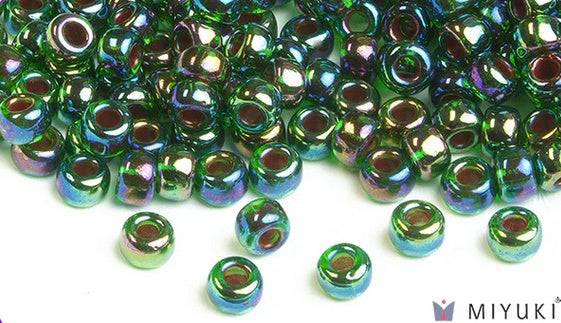 Miyuki 6/0 glass seed beads in the color 344 Cobalt lined Green AB