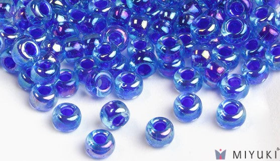 Miyuki 6/0 glass seed beads in the color 353 Cobalt lined sapphire AB