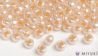 Miyuki 6/0 glass seed beads in the color 516 Pale Gold Ceylon