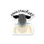 Vinyl Sticker with a sheep holding a crochet hook and the saying "ewe crochet?"