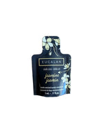Eucalan jasmine sample packet on a wooden surface