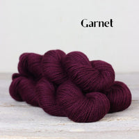 The Fibre Co. Road to China Light yarn in the color Garnet