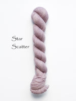 Madelinetosh Hand dyed tosh pebble yarn in the color Star Scatter Solid