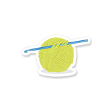 Vinyl Sticker with a yellow ball of yarn and a crochet hook
