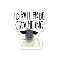 Vinyl Sticker with a sheep holding a crochet hook and the syaing "I'd rather be crocheting"