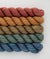 Sweet Georgia Party of Five Mini Skein Sets of Tough Love Sock yarn in the color combo Blazing Trails