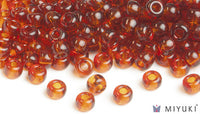 Miyuki 6/0 glass seed beads in the color 134 Transparent Copper