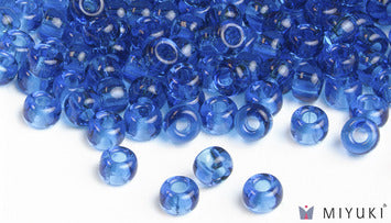 Miyuki 6/0 glass seed beads in the color 149 Transparent Capri Blue