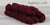 The Fibre Company Amble Yarn Mini Skein in the color Appleby Castle (deep red)