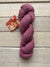 Mirasol Nieva yarn in the color Bordeaux 08