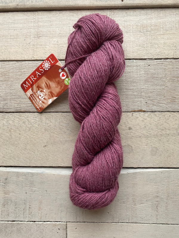 Mirasol Nieva yarn in the color Bordeaux 08