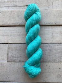 Keenan Hand Dyed Yarn Superwash Sock in color Teal for Two