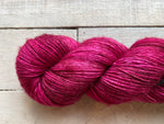 Madelinetosh Tosh Merino Light Yarn in the color  Coquette-Deux
