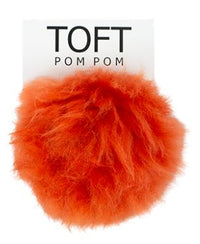 Toft Alpaca Pom in the color Orange