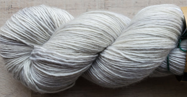 Madelinetosh Tosh Merino Light Yarn in the color Farmhouse White (light grey)