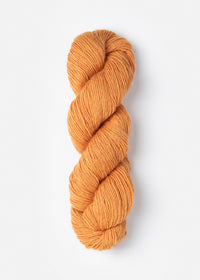 Woolstok Light yarn in the color Ember Glow 2323 (golden)