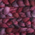 Malabrigo Nube unspun merino top hand dyed in the color Cereza (reds)