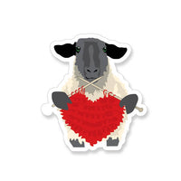 Vinyl Sticker with a sheep knitting a heart